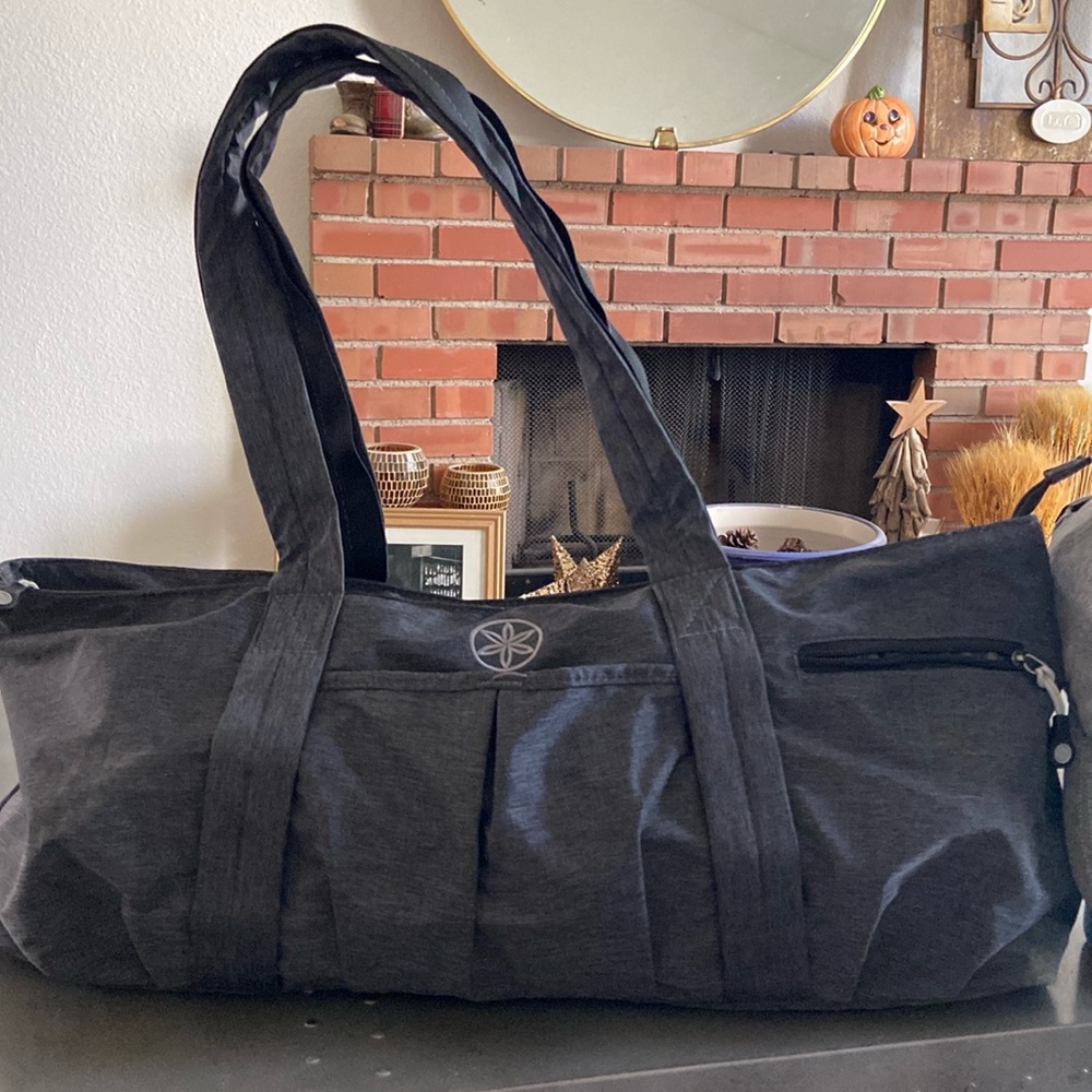 Gaiam yoga duffle bag. Never used. Lots of inside/out zipper storage.